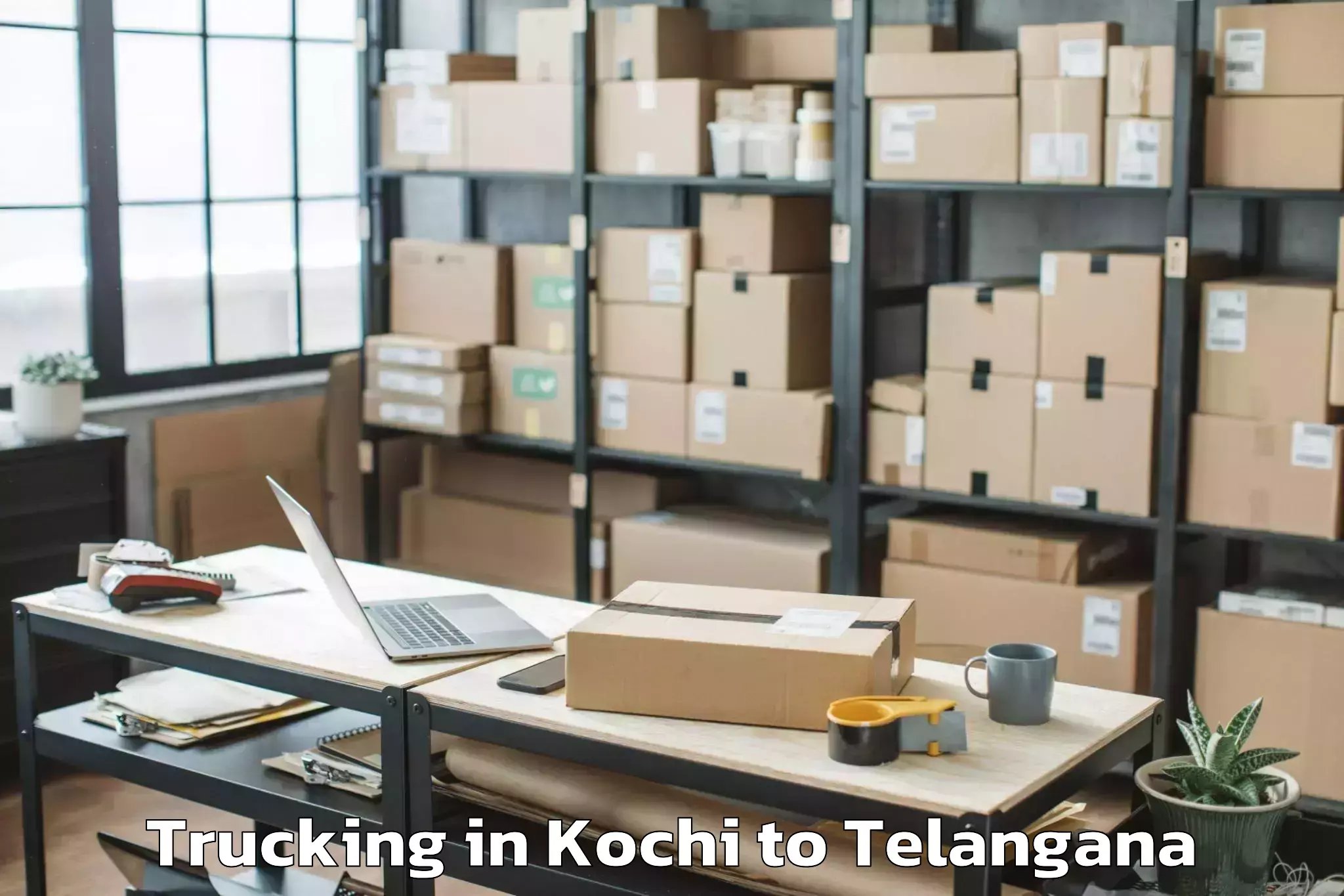 Easy Kochi to Mulugu Trucking Booking